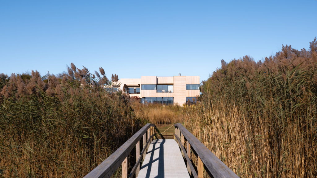 Hamptons coastal home with boardwalk view